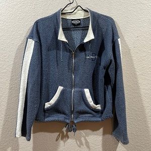 Woman’s zip up sweater jacket, blue.